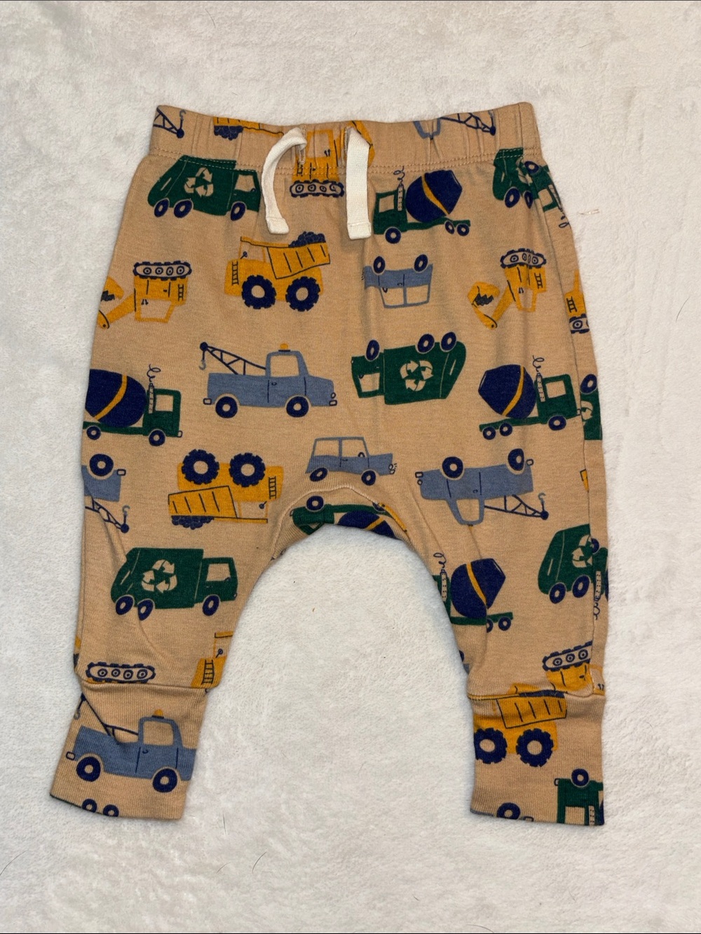 Joe fresh Tan Baby Pants with Green, Blue, and Yellow Trucks